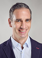 Dr. Tobias König